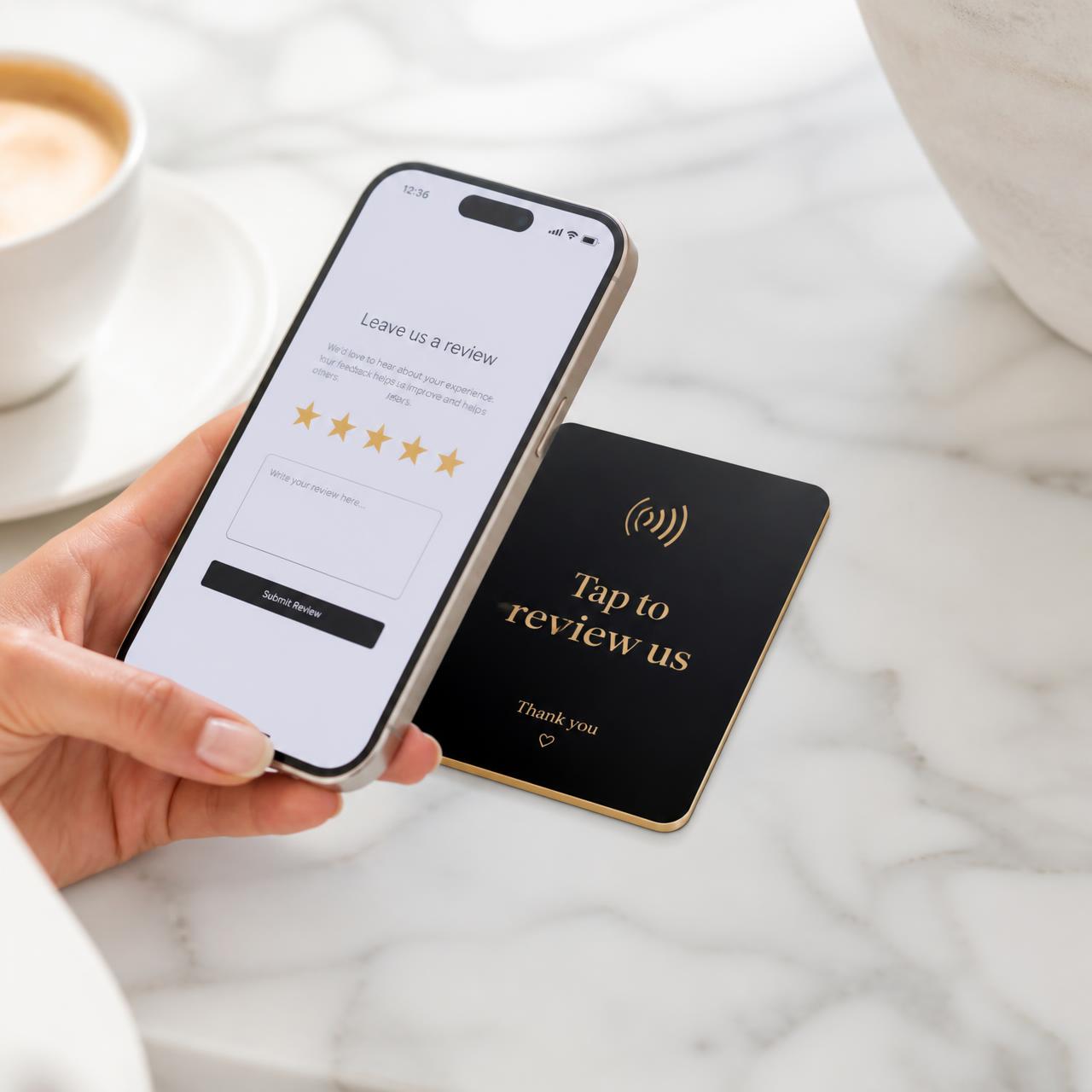 A customer taps a smartphone on a branded TapReview Pro NFC card and the Google review page opens